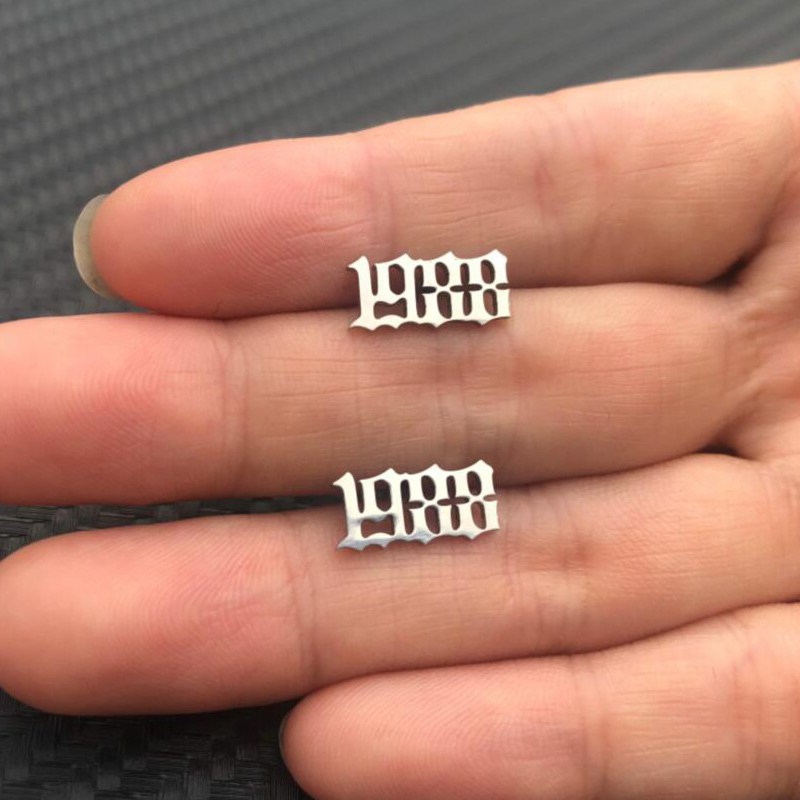 Pendientes de acero inoxidable - Men'S Fashion Year 2000 reseña y precio